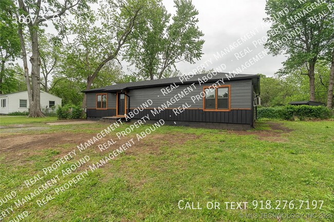 Building Photo - 5667 S Quincy Ave