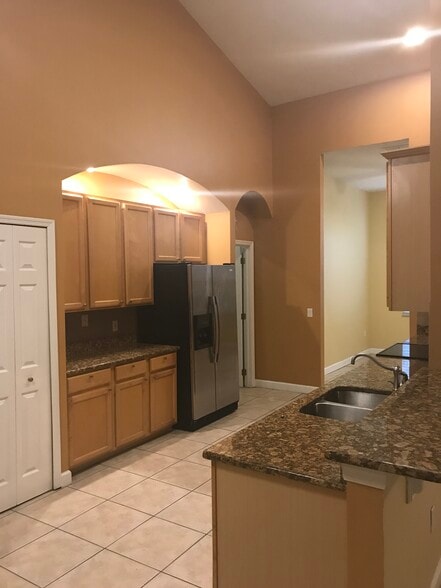 Kitchen with adjacent formal dining area - 1751 Crown Hill Blvd