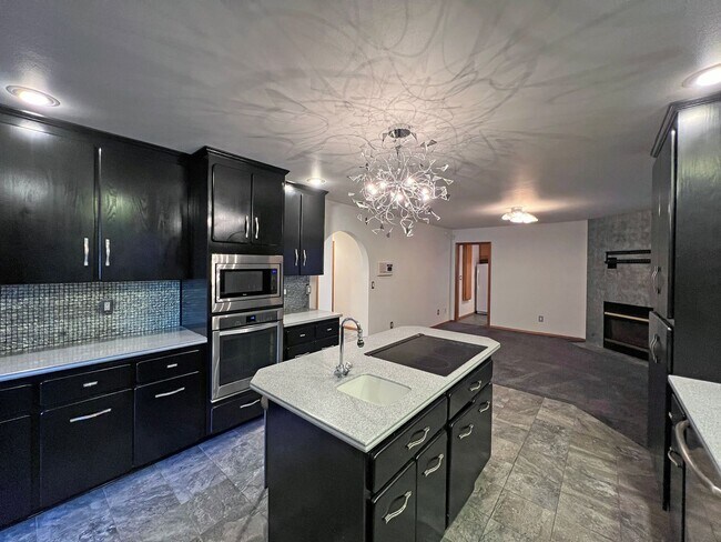 Building Photo - Stunning 4 Bedroom 2.5 Bath with Peek-a-Boo View of Puget Sound
