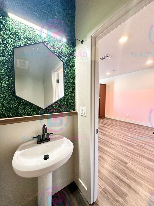 Building Photo - 1 Month Fee!-Specific. Modern Designer 2 Bedroom 2.5 Bathroom Townhome with Smart Features, Tesla...