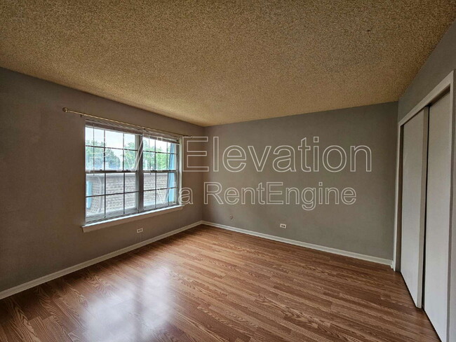 Building Photo - 9430 E Girard Ave