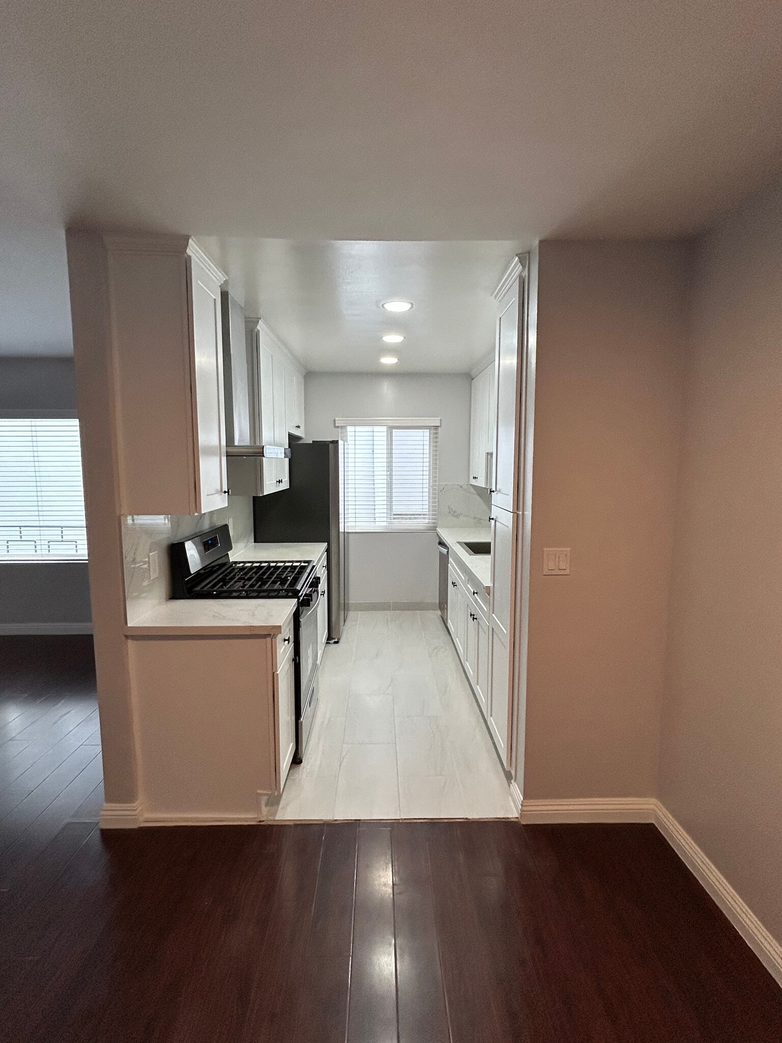 Kitchen from Dining Area - 325 S Doheny Dr