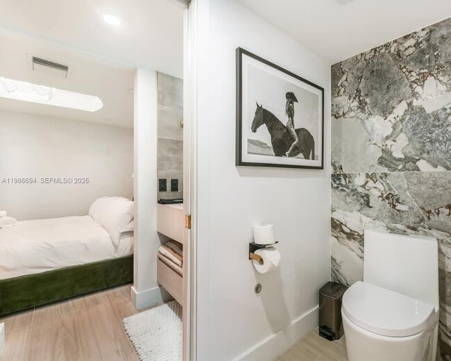 Building Photo - 100 Collins Ave