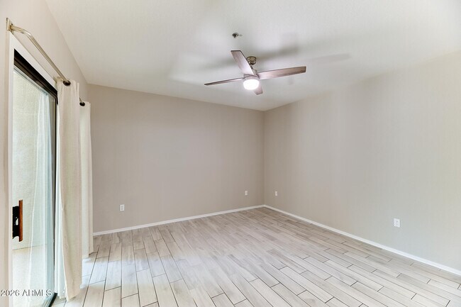 Building Photo - 9555 E Raintree Dr