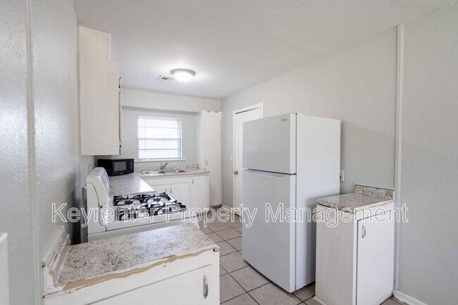 Building Photo - 230 E 51st Pl N