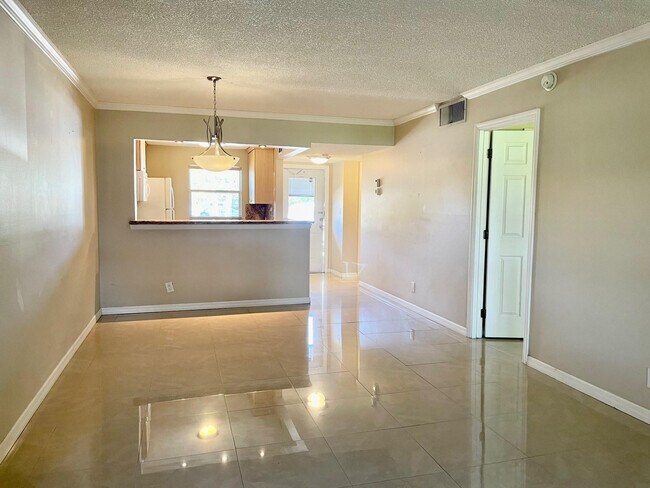 Building Photo - 608 SW Natura Blvd