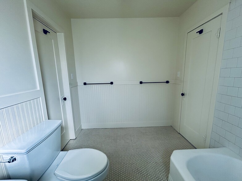 Bathroom, two doors, one to bedroom, one to "half" room - 3442 1st St