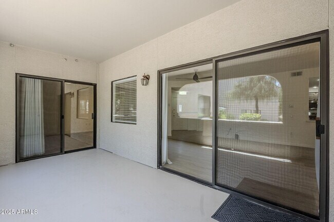 Building Photo - 9455 E Raintree Dr
