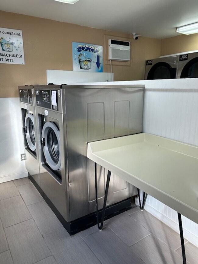 Building Photo - Top-Floor Condo with Trail Access + Community Perks!