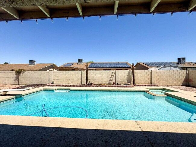 Building Photo - "Charming 3-Bed, 2-Bath Solar and Pool Home!"