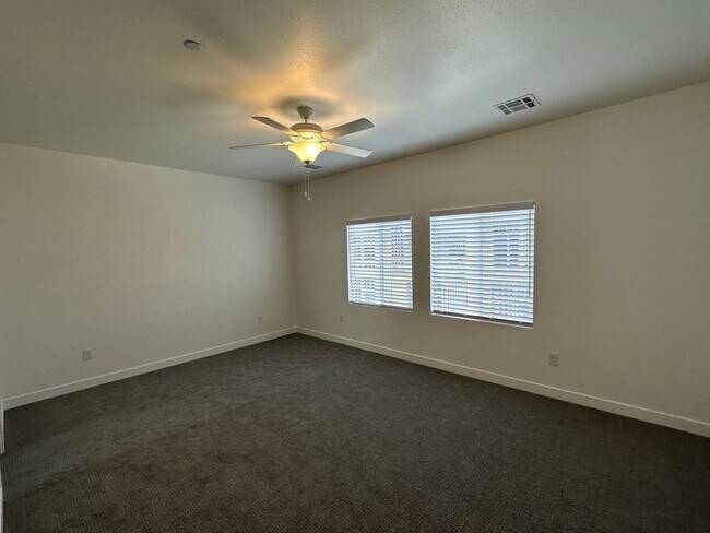 Building Photo - Experience Modern Elegance in this Summerlin Townhouse