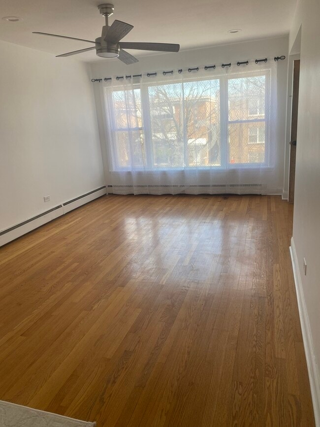 Building Photo - 5530 N Mango Ave