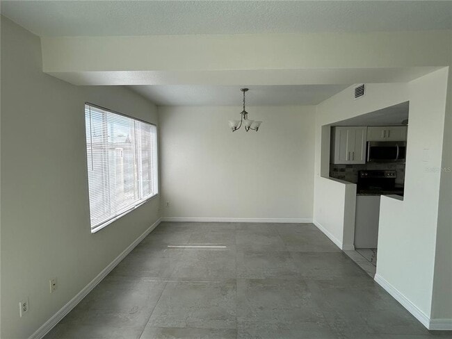 Building Photo - 202 Washington Palm Loop
