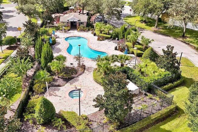Building Photo - "Stunning 3BR Orlando Home with Private Screened Pool, Spa & Spacious Living Areas"