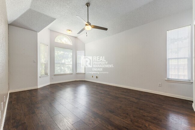 Building Photo - Recently Updated Plano Property with Modern Features and Serene Surroundings
