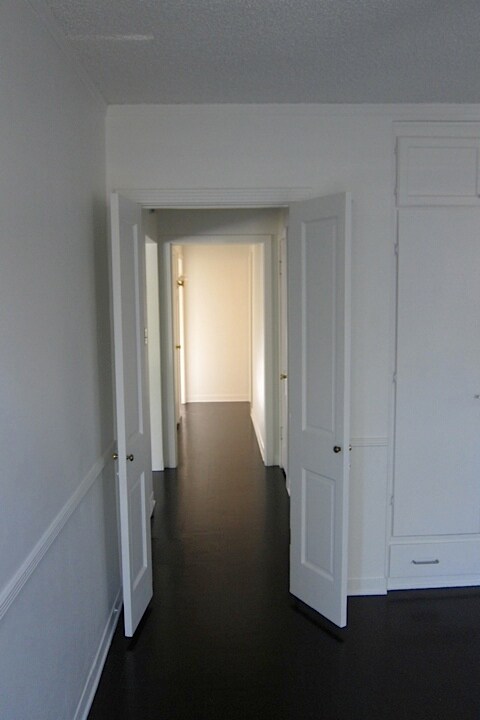Hallway leading from front bedroom to back of house - 4927 Forman Ave
