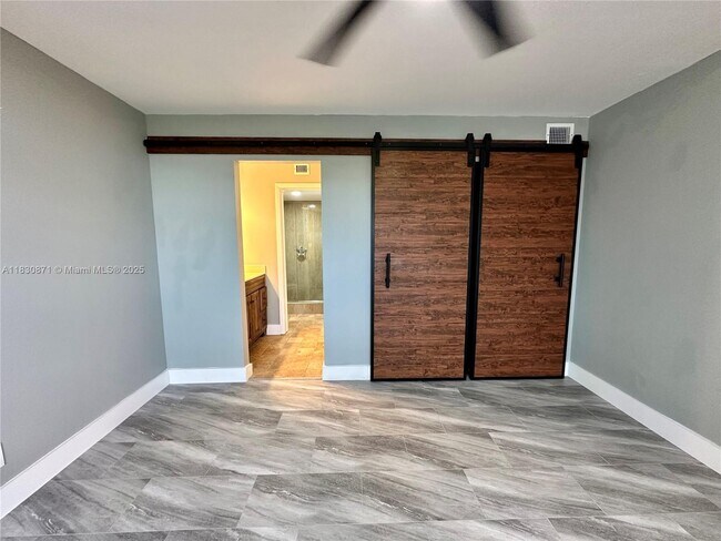 Building Photo - 6575 W Oakland Park Blvd