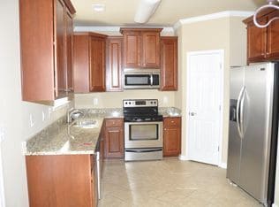 Building Photo - 4 Bedrooms, 3 Full Bathrooms and 1 Half Bath