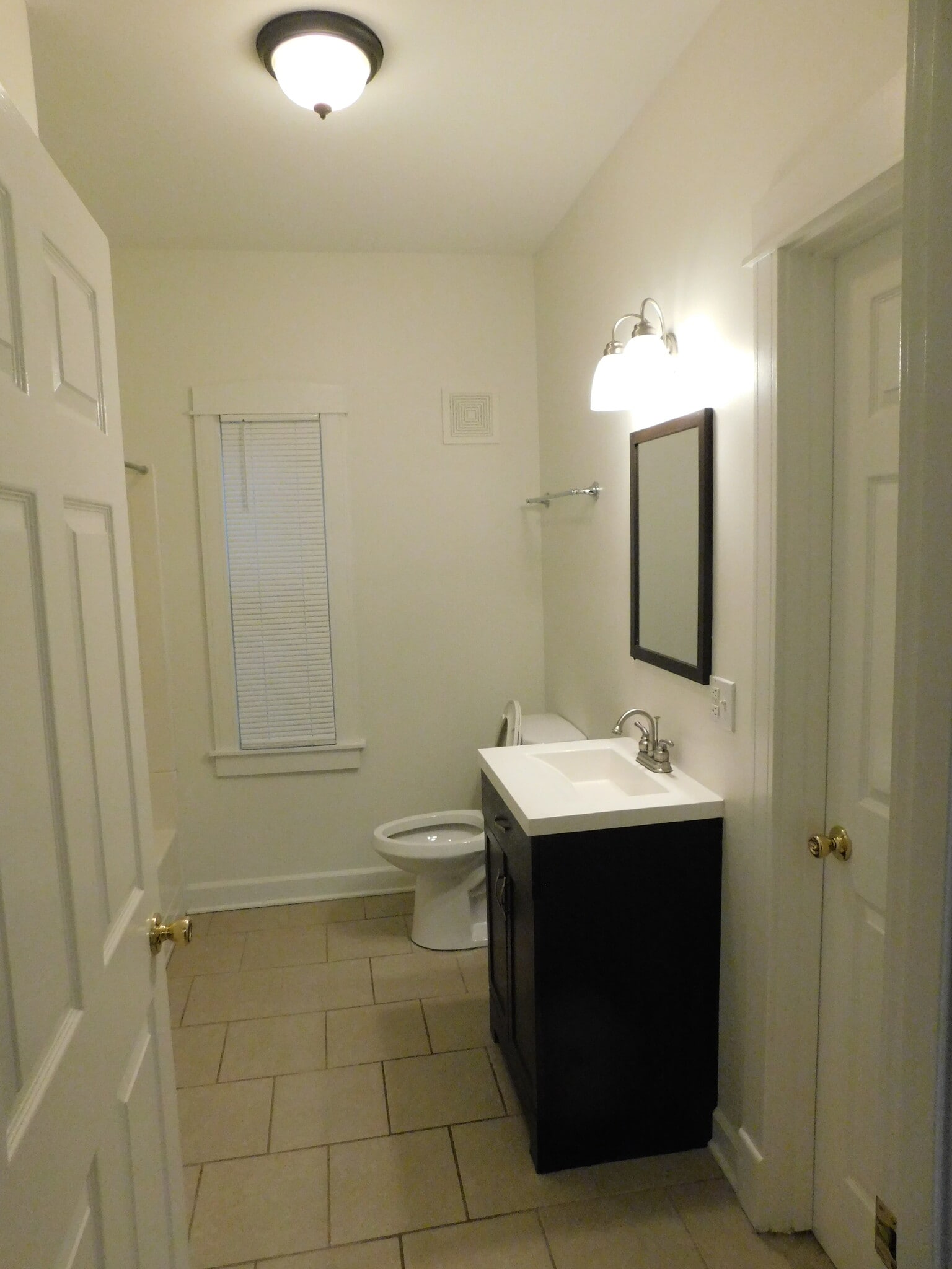 New vanity being installed in 2nd bathroom. Includes tub with shower. - 1566 Dewey Ave