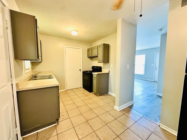 Building Photo - Updated three bedroom ranch in Okolona now...