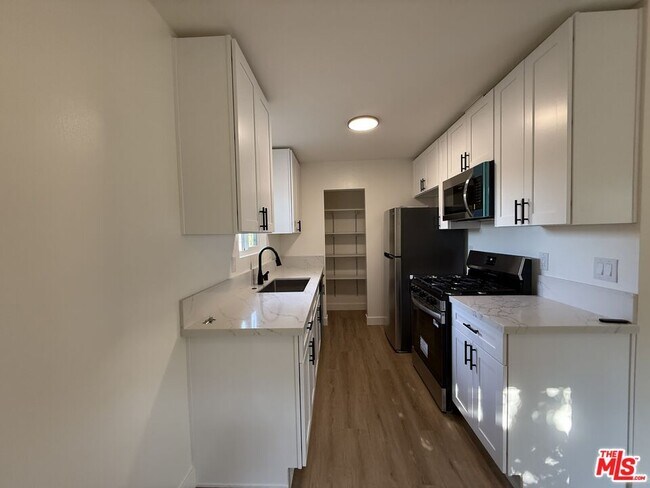 Building Photo - 3707 S Canfield Ave