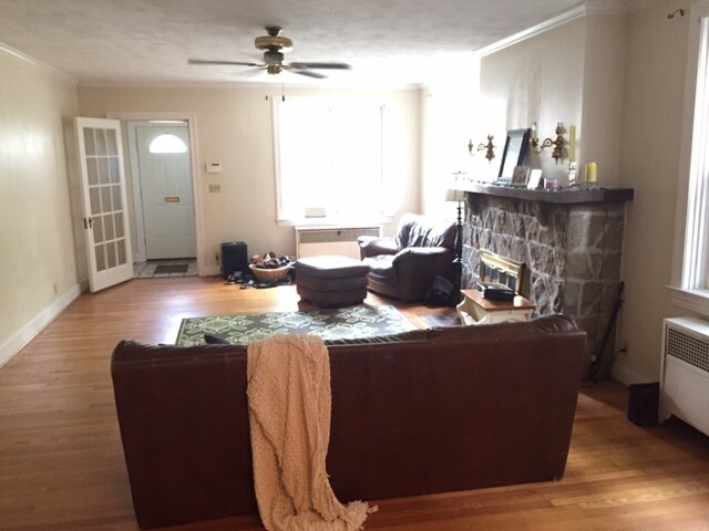 living room with wood buring fire place - 802 Gaskill Ave