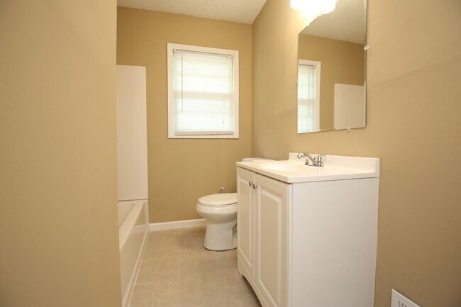 Building Photo - You’ll Love the Layout & Luxury Touches in...