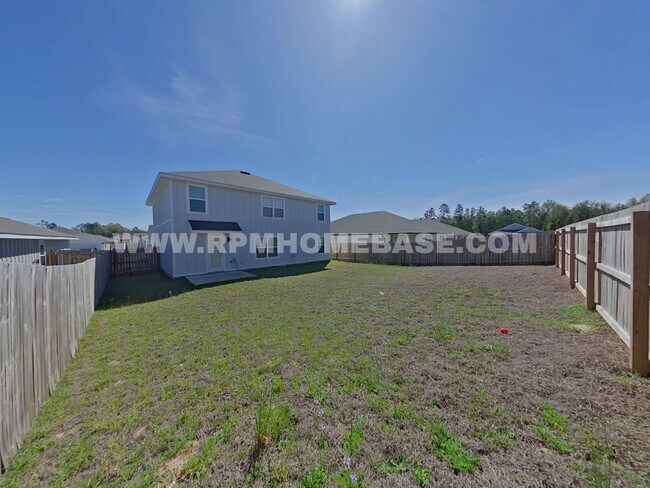 Building Photo - Spacious 5-Bedroom Home in Shoal River Community with Modern Features and Community Pool Access!