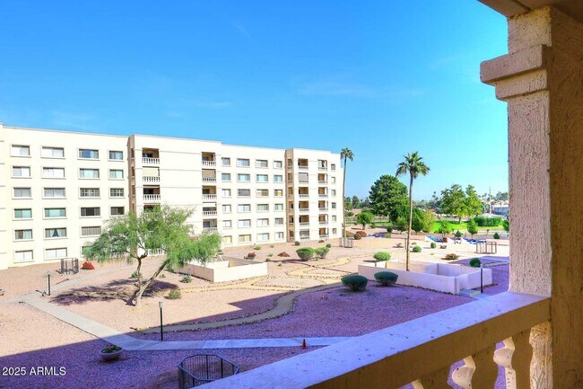 Building Photo - 7910 E Camelback Rd