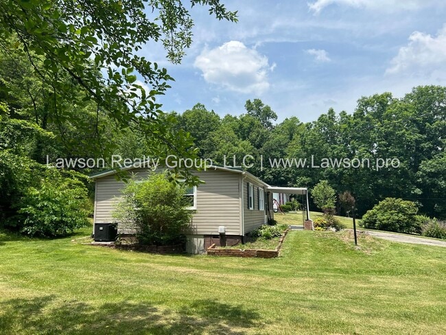 Building Photo - Close to Carvins Cove- One Level Living with Hobby Shed