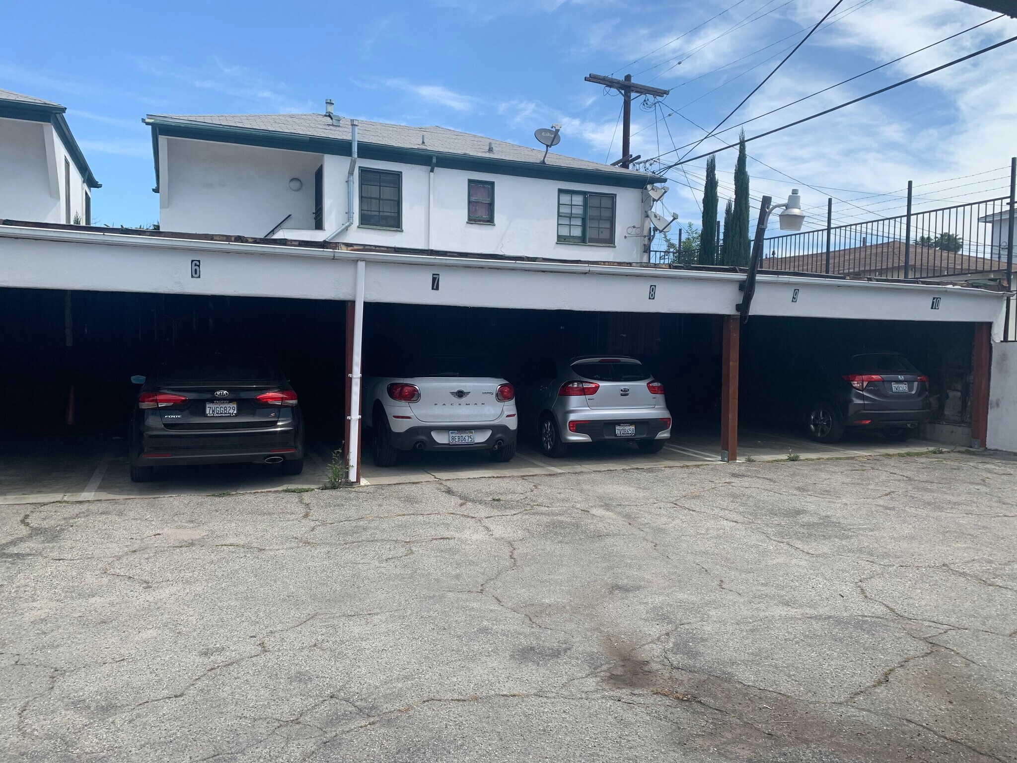 Covered, assigned parking located in back enclosed area - 3616 W Adams Blvd