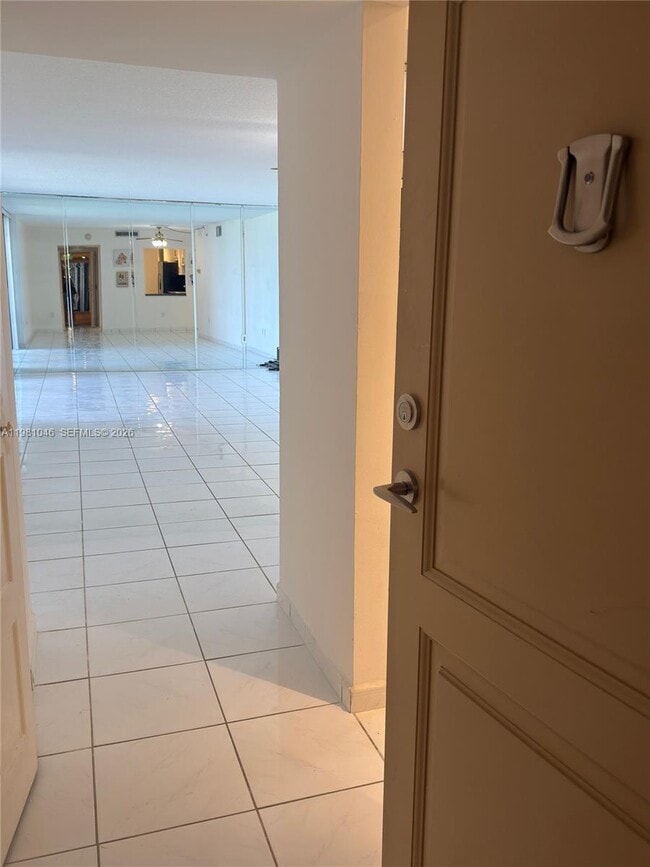 Building Photo - 3675 N Country Club Dr