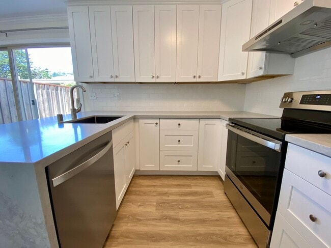 Building Photo - Newly Renovated Condo with NEW KITCHEN! - ...