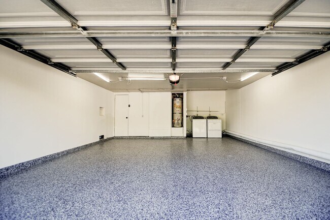 Building Photo - Updated, 3 bedroom 2.5 bath townhouse located in the Newport Riviera Community