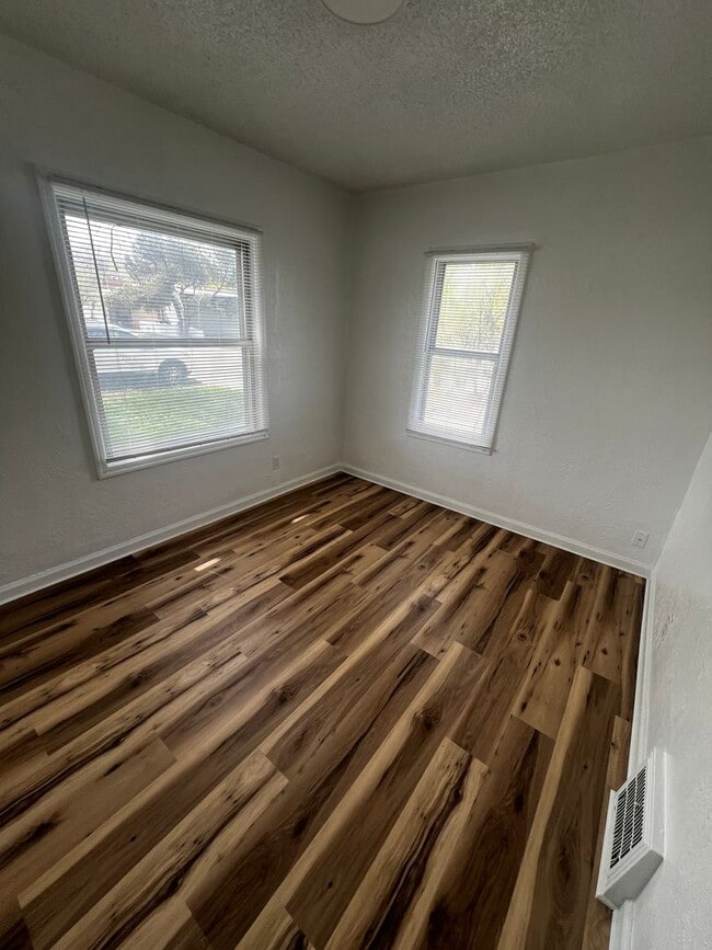 Building Photo - Updated 4-Bedroom 1.5 Bathroom Home with Fenced Yard