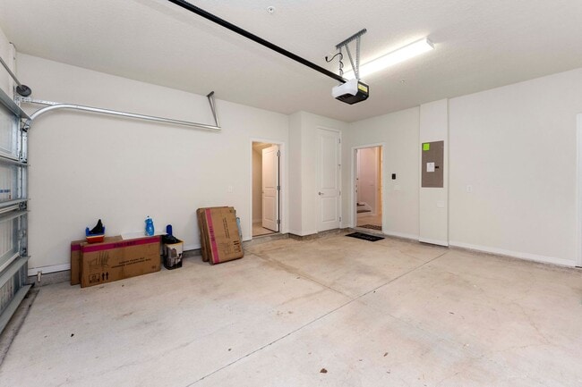 Building Photo - Introducing a captivating 3-story townhome...