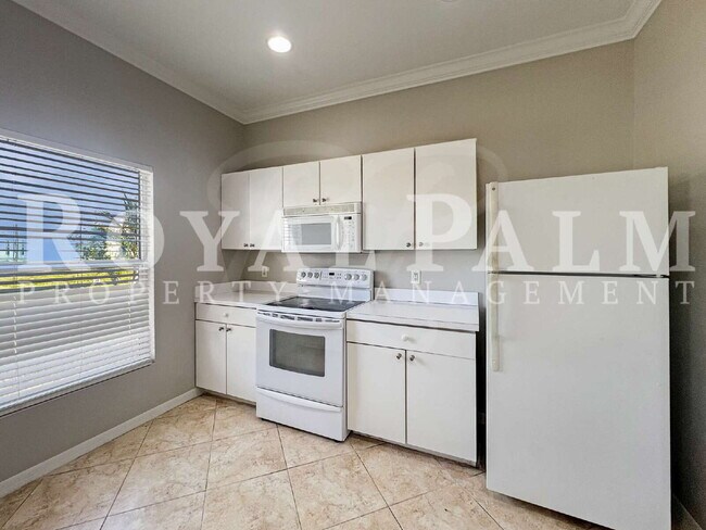 Building Photo - 3BR/2BA Home Ready to Bloom in Lehigh Acres. Garage + Spring Savings Included!