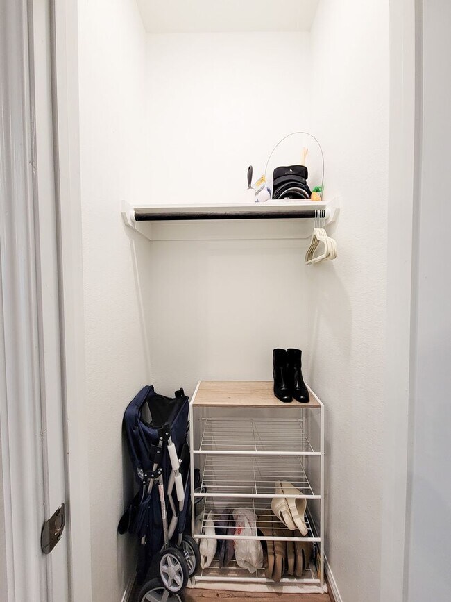 Building Photo - A true gem on a quiet corner lot, this spacious and sun-filled home is tucked away from street no...