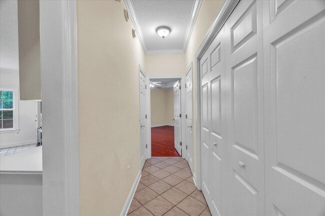 Building Photo - Stunning all-brick home on a large wooded lot