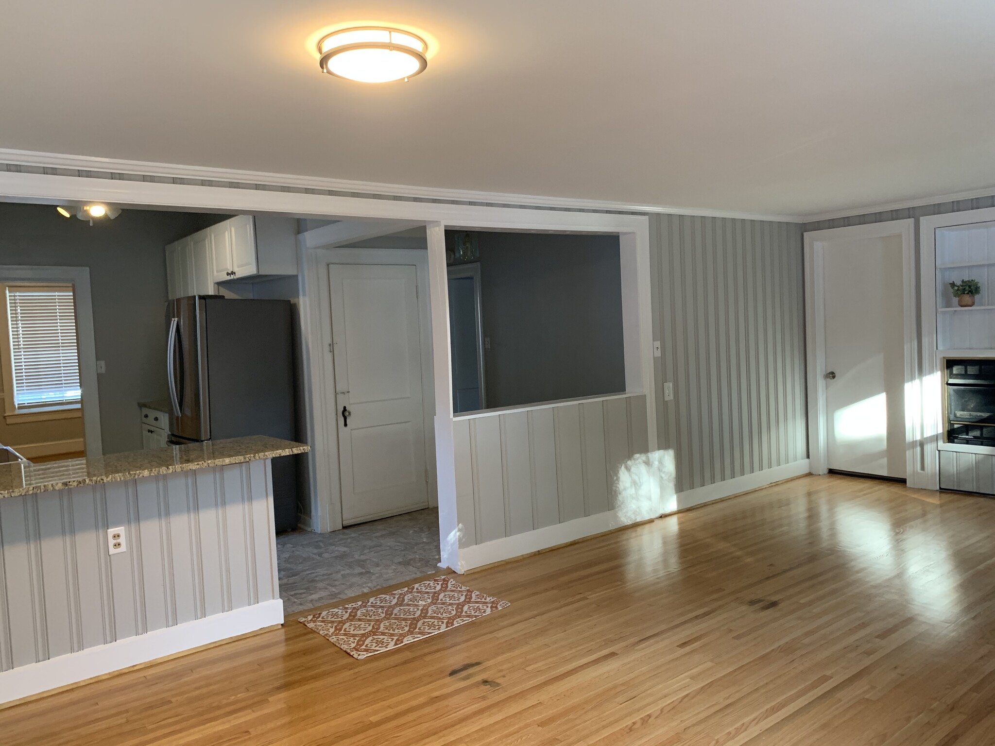 Den (looking towards kitchen). Door connects to laundry room. - 166 Montague St