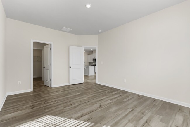 Building Photo - Brand-New 4-Bedroom/3-Full Bathroom Townho...