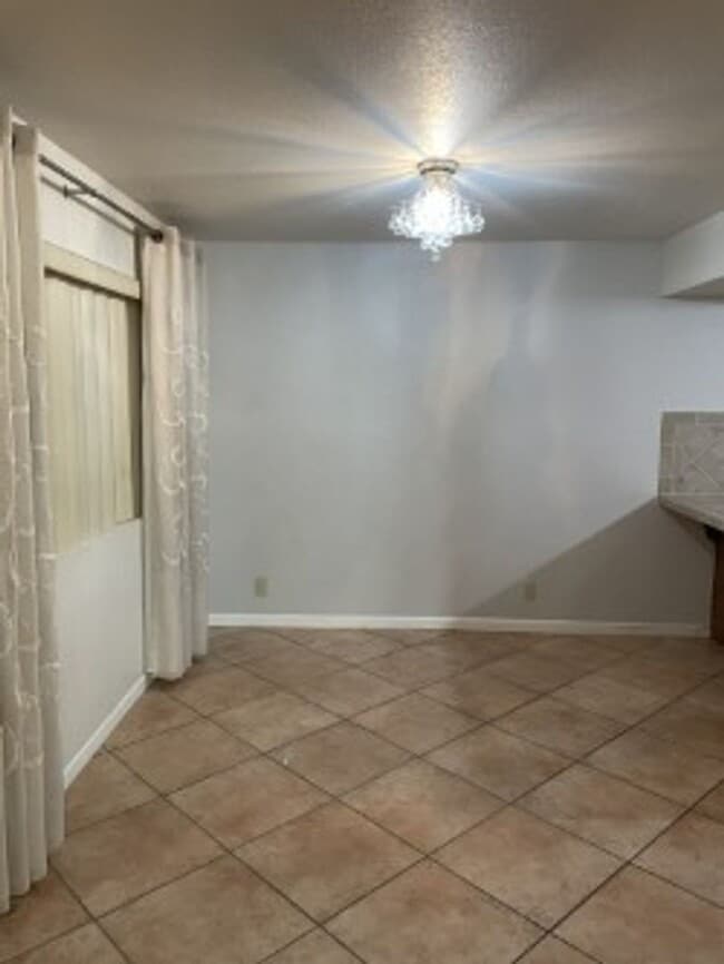 Building Photo - Spacious 3 bedroom, 3 bath, condo with a l...