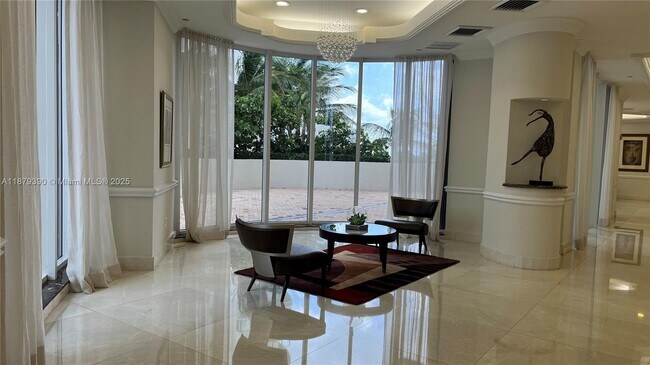 Building Photo - 18671 Collins Ave