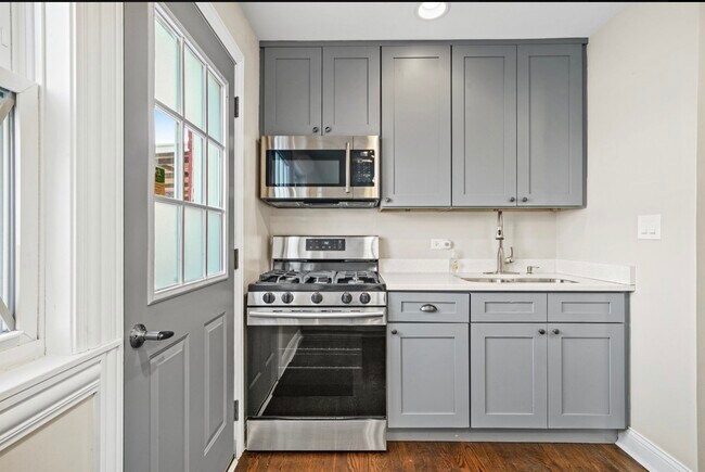 Building Photo - 6350 S Lockwood Ave