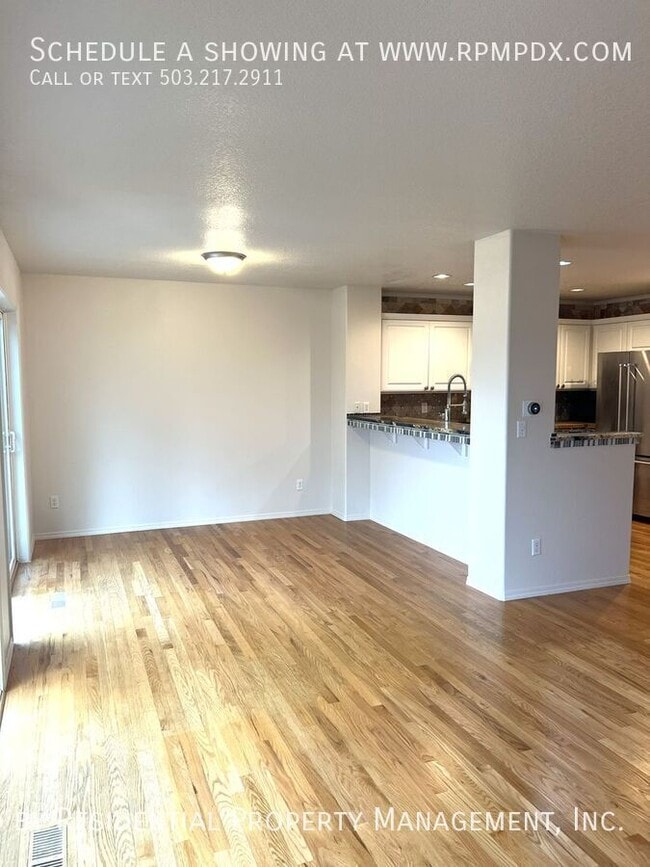 Building Photo - 6463 NW Wenmarie Dr