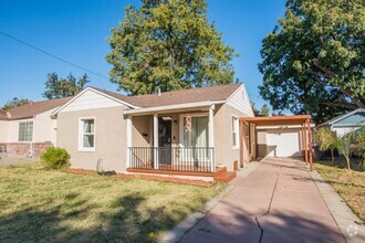 Building Photo - This 2 bedroom, 1 bathroom charmer is read...