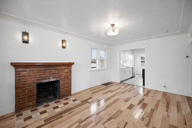 Building Photo - Remodeled 3BR/2BA Brick Bungalow - Fireplace, Finished Basement & Garage