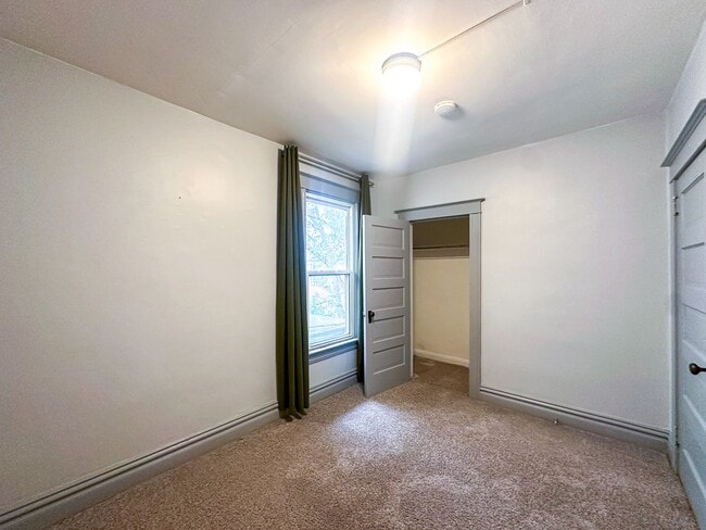 Building Photo - A home where old-world charm meets modern sophistication!
