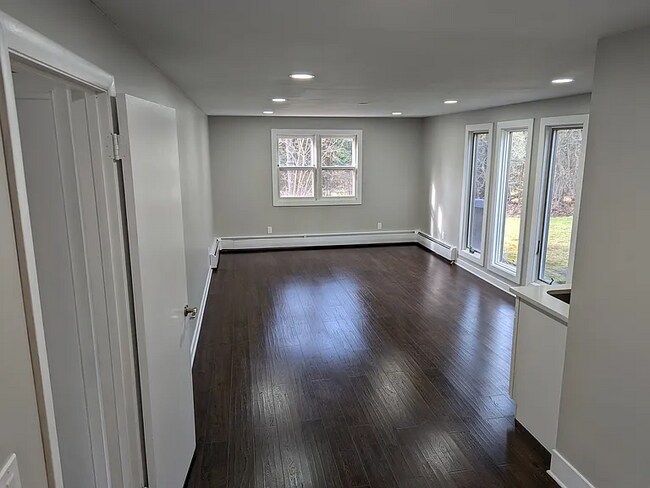 Building Photo - this contemporary & brightly remodeled 2,400 sqft home