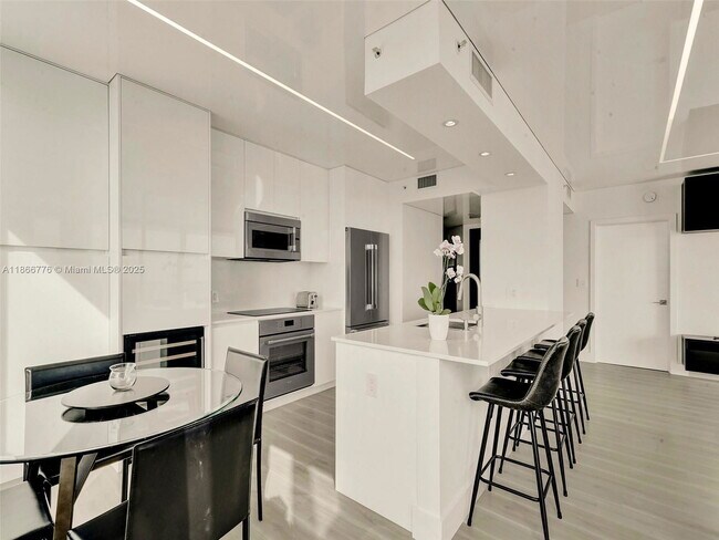 Building Photo - 6365 Collins Ave